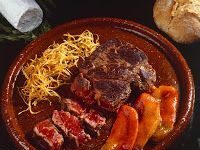 Chuletas de ternera al queso